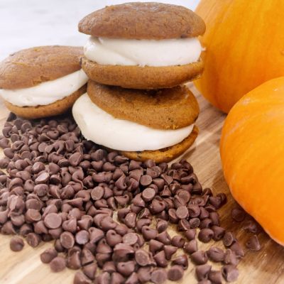 Pumpkin Chocolate Chip Whoopie Pies with Browned Butter Cream Cheese Frosting